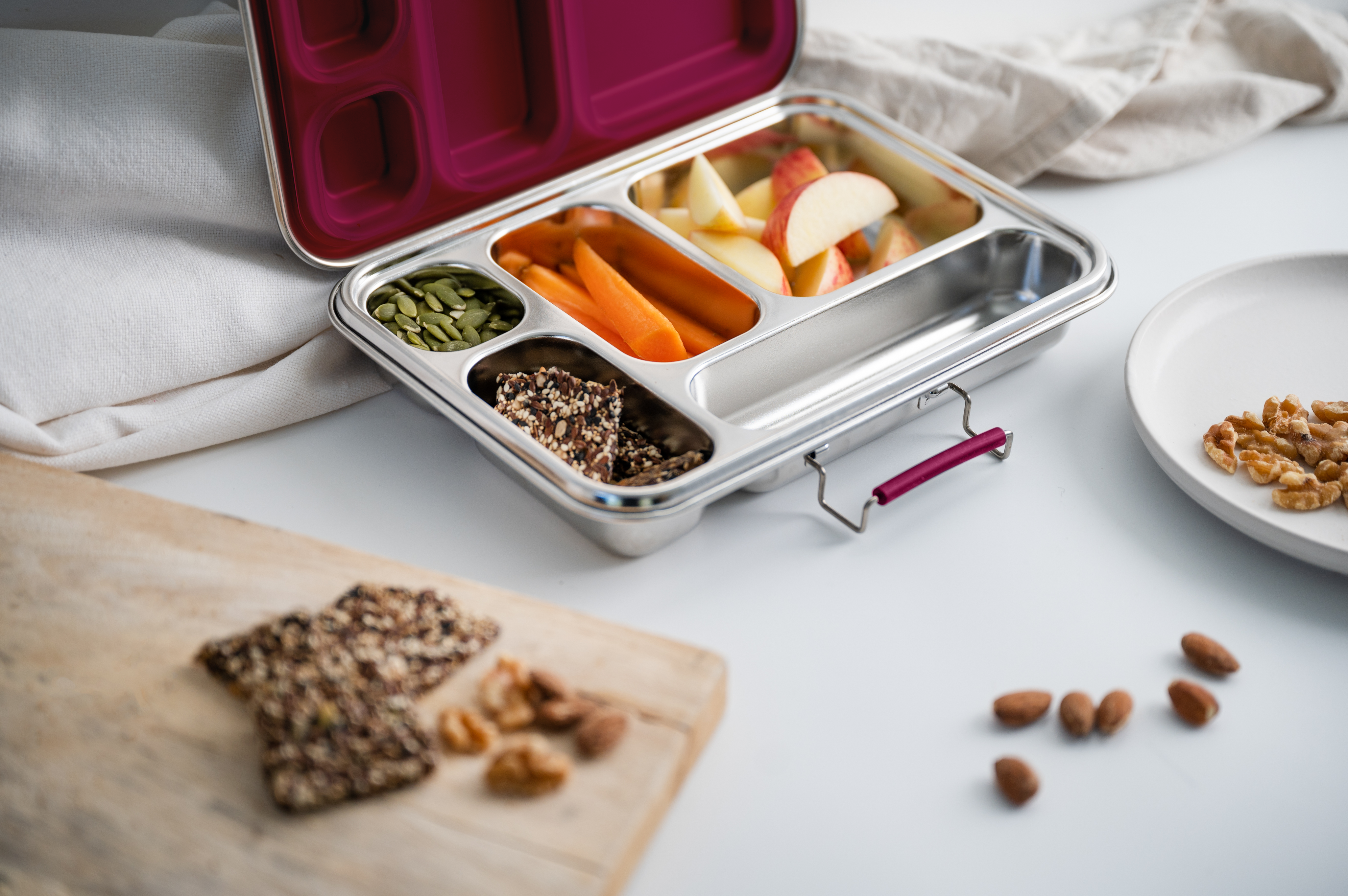 Stainless Steel CaliWoods Lunch Box Bento with carrots, apples, seeds and nuts