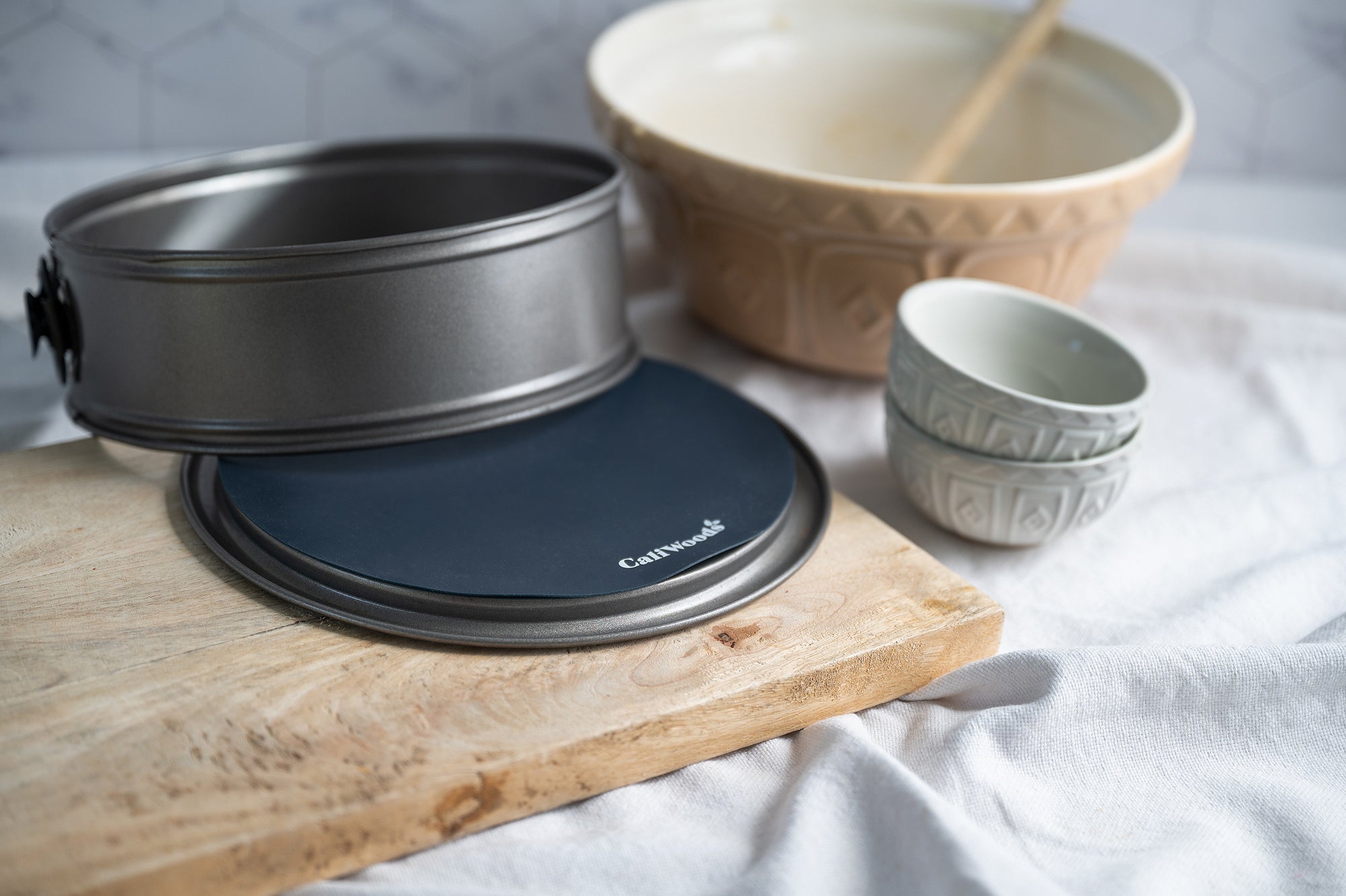 Circular Baking Mats on a chopping board