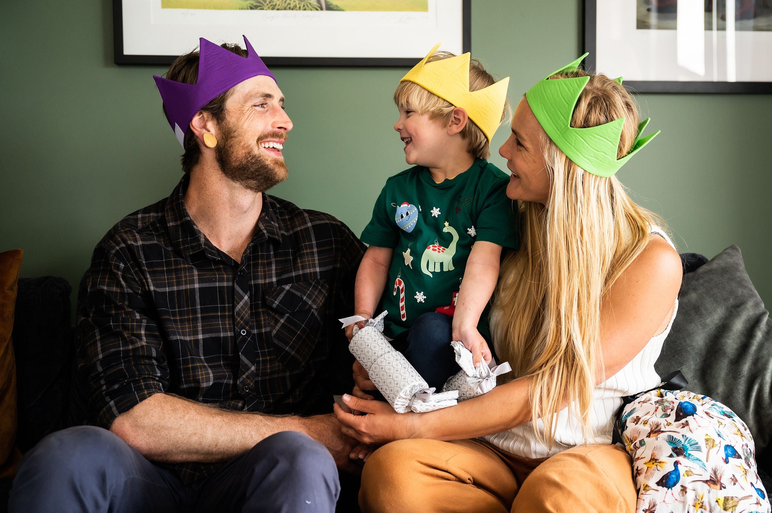 Family smiles while wearing caliwoods reusable party hats