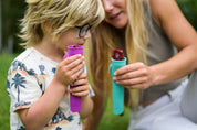 Mother and Son holding Summer homemade Ice Blocks in NZ