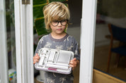 Blonde Boy holding CaliWoods compartment bento lunchbox